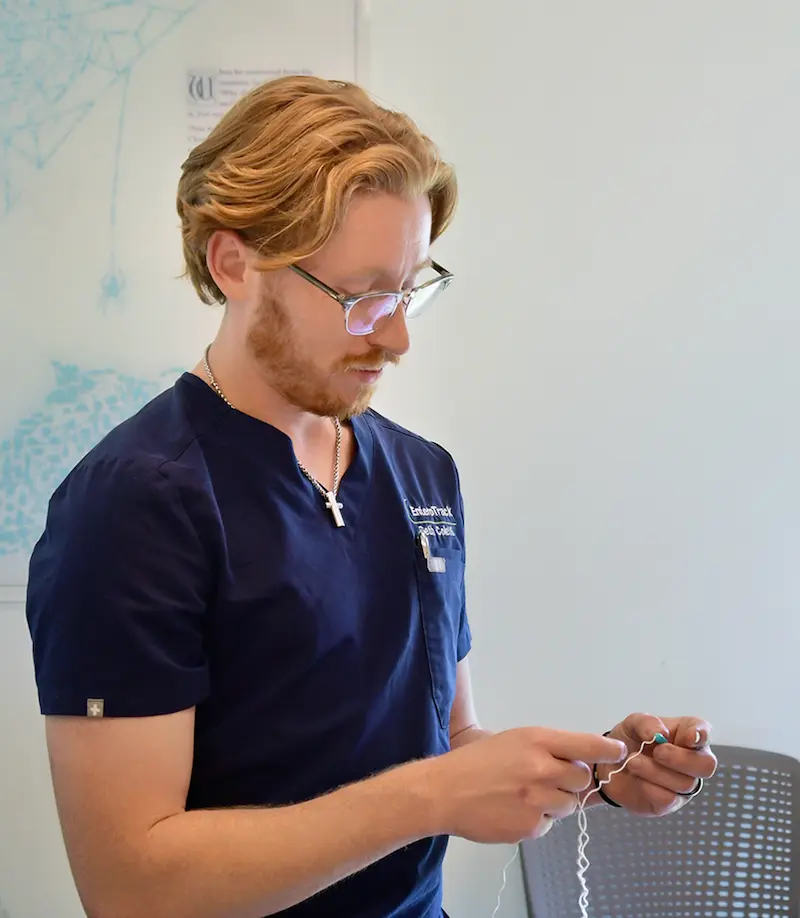 Clinicians discussing EnteroTracker